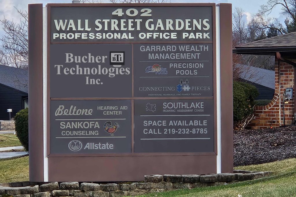 Original Bucher Technologies sign at 402 Wall Street Gardens Professional Office Park